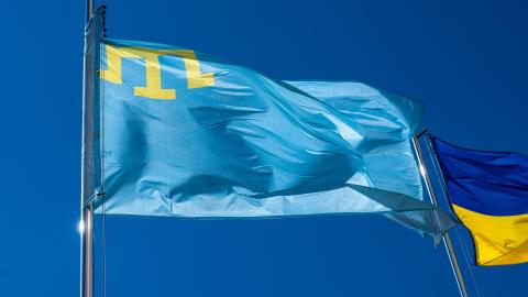 The Crimean Tatar flag flies on a flagpole in front of the Lviv Oblast Military Administration on May 17, 2024, in Lviv, Ukraine. (Stanislav Ivanov via Getty Images)
