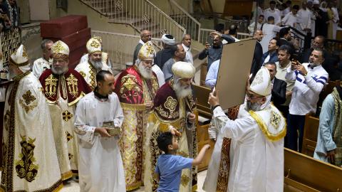 Coptic Orthodox Christians gather for an Easter service at the Monastery of Saint Simon the Tanner, located in the Mokattam Mountain area of Cairo, on April 19, 2025. (Ahmed Sayed via Getty Images)