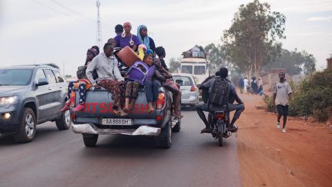 Passengers ride on the back of a crowded pickup truck on November 8, 2025, as a jihadist blockade upends daily life in the capital Bamako, Mali. (Getty Images)