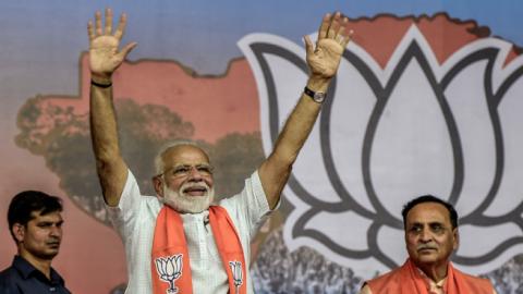 Narendra Modi waves to the supporters from the public rally May 26, 2019 in Ahmedabad, India. (Atul Loke/Getty Images)