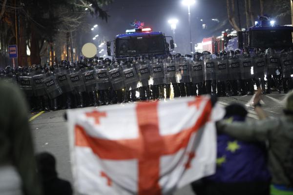 Clashes erupt between Georgian police and protesters on the second day of protest against "foreign agents" bill, in Tblisi, Geogia on March 08, 2023 (Photo by David Mdzinarishvili/Anadolu Agency via Getty Images)