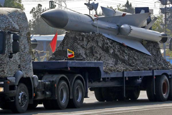 An Iranian military truck carries missiles during a parade on the occasion of the country's annual army day, April 18, 2018 