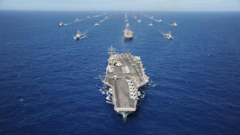 The Nimitz-class aircraft carrier USS Ronald Reagan leads a mass formation of ships from Korea, Taiwan, Japan, Singapore, France, Canada, Australia and the U.S. during Rim of the Pacific 2010. RIMPAC is the