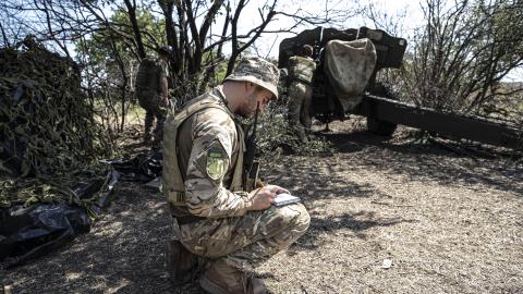 Ukrainian artillerymen check their weapons and special equipment before going to the frontline in Kherson, Ukraine, on July 15, 2022. (Photo by Metin Aktas/Anadolu Agency via Getty Images)