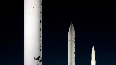 A static display of intercontinental ballistic missiles at the F.E. Warren Air Force Base, Wyo., front gate the evening of April 4, 2012. From left are the Peacekeeper, the Minuteman III and the Minuteman I. The planet Venus is visible in the sky above the Minuteman missiles and Jupiter is visible to the left of the Minuteman I. (U.S. Air Force photo by R.J. Oriez)