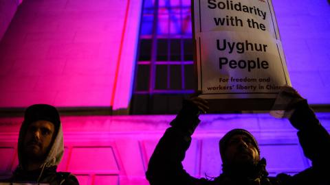 Uyghur rights activists stage a demonstration outside the Chinese embassy in London, England, on January 5, 2020. (David Cliff/NurPhoto via Getty Images)