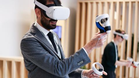 People use Meta Quest VR headset at the Meta showroom in Brussels, Belgium, on December 7, 2022. (Kenzo Tribouillard/AFP via Getty Images)