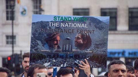 A demonstrator holds a pro–National Resistance Front placard during a protest in Trafalgar Square on September 12, 2021. (Vuk Valcic/SOPA Images/LightRocket via Getty Images)