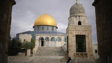 A man walks outside the near deserted historic Al-Aqsa Mosque complex on November 12, 2023, in Jerusalem. (Photo by Christopher Furlong/Getty Images)