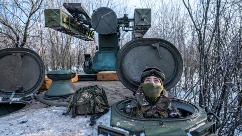 A Ukrainian soldier looks at the sky after hearing the sound of a nearby drone at the Bakhmut frontline in Donetsk Oblast, Ukraine, on January 13, 2024. (Photo by Ignacio Marin/Anadolu via Getty Images)