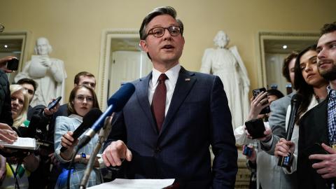 Speaker of the House Mike Johnson speaks to the press after the House passed a major aid package for Ukraine, Israel, and Taiwan and also voted to ban TikTok at the US Capitol in Washington, DC, on April 20, 2024. (Photo by Drew Angerer/AFP via Getty Images)