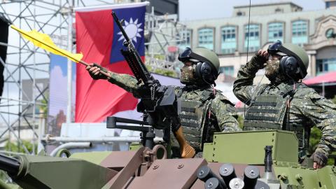 Armored vehicles are deployed during a shore defense operation as part of a military exercise simulating a Chinese military intrusion in Tainan, Taiwan, November 11, 2021. (Photo by Ceng Shou Yi/NurPhoto via Getty Images)