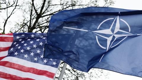 American and NATO flags are seen in Warsaw, Poland, on April 12, 2024. (Jakub Porzycki/NurPhoto via Getty Images)