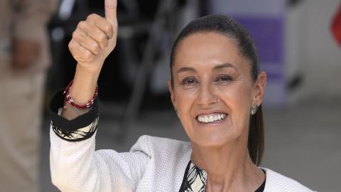 Presidential candidate Claudia Sheinbaum shows her inked fingerprint after casting her vote during the presidential elections in Mexico City, Mexico, on June 2, 2024. (Photo by Cristopher Rogel Blankquet/Getty Images)