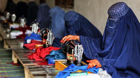 Afghan women use sewing machines at a workshop in Jalalabad, Afghanistan, on December 1, 2022. (Photo by AFP) (Photo by -/AFP via Getty Images)