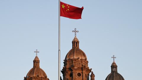 The Chinese national flag flies in front of St Joseph’s Church, also known as Wangfujing Catholic Church, in Beijing on October 22, 2020. (Greg Baker via Getty Images)