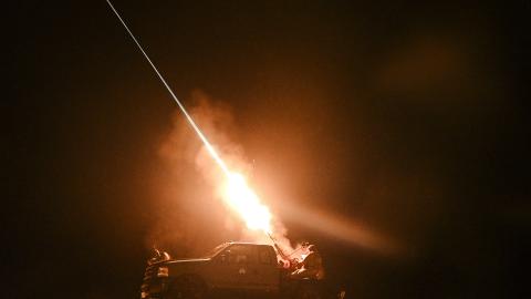 Ukrainian servicemen of the mobile air defense unit fire a machine gun at Russian drones during night patrol on December 2, 2024, in Chernihiv Oblast, Ukraine. (Maksym Kishka/Global Images Ukraine via Getty Images)