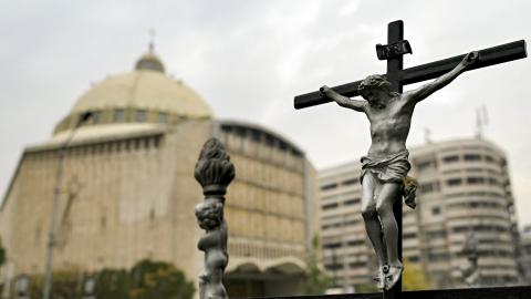 A crucifix is pictured outside the Syriac Catholic Cathedral of Our Lady of the Assumption in Aleppo, Syria, on December 12, 2024. (Ozan Kose/AFP via Getty Images)