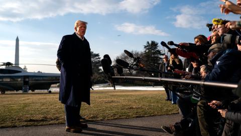 President Donald Trump speaks to members of the press as he and first lady Melania Trump prepare to depart the White House on January 24, 2025, in Washington, DC. (Kent Nishimura via Getty Images)