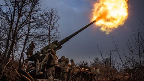 Ukrainian soldiers work on a Soviet era Pion self propelled howitzer in the direction of Chasiv Yar, Ukraine, on January 27, 2025. (Wolfgang Schwan/Anadolu via Getty Images)