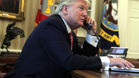 President Donald Trump speaks on the phone with Irish Prime Minister Leo Varadkar on June 27, 2017, in Washington, DC. (Alex Wong via Getty Images)