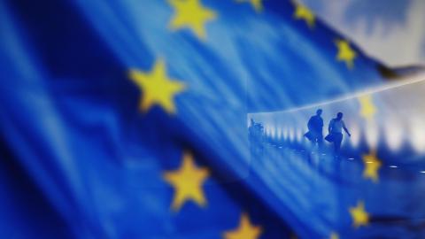 People walk by an European flag in the German Lower House of parliament ahead of the upcoming summit of the European Council and the upcoming NATO summit in Washington, DC, on June 26, 2024, in Berlin, Germany. (Michele Tantussi/Getty Images)