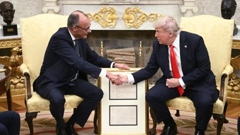 US President Donald Trump and German Chancellor Friedrich Merz shake hands during a bilateral meeting in the Oval Office of the White House in Washington, DC, on June 5, 2025. (Brendan Smialowski via Getty Images)