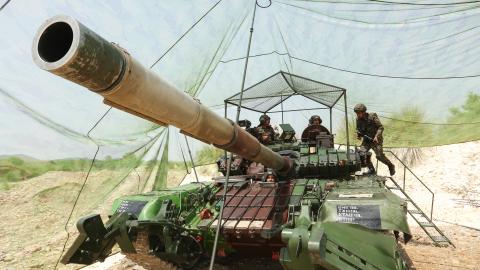 Indian army soldiers are seen atop a tank near the Line of Control near Akhnoor, India, on May 19, 2025. (Mukesh Gupta via Getty Images)