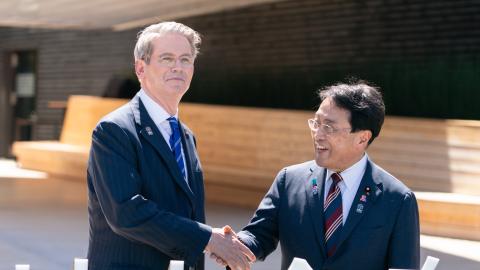 US Treasury Secretary Scott Bessent and Japan’s Minister of State for Economic and Fiscal Policy Ryosei Akazawa shake hands during a photo session as they arrive at the USA Pavilion on US National Day at the World Expo 2025 on July 19, 2025, in Osaka, Japan. (Tomohiro Ohsumi via Getty Images)