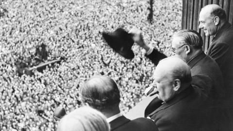 From a balcony in the Ministry of Health Building in London, Prime Minister Winston Churchill addresses a huge crowd on May 8. 1945 (Victory in Europe Day). (Getty Images)