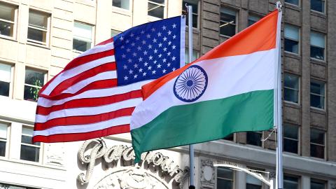 The national flag of India is hoisted next to the US national flag at Times Square to mark Indian Independence Day in New York City. (Jamie McCarthy via Getty Images)