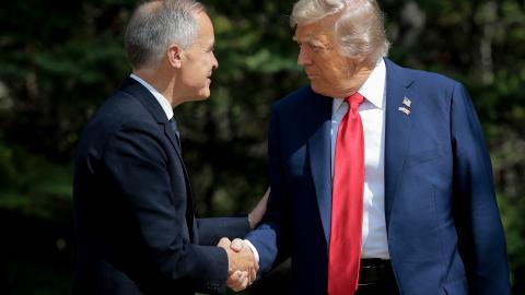 KANANASKIS, ALBERTA - JUNE 16: Canadian Prime Minister Mark Carney greets U.S. President Donald Trump at the official welcome ceremony during the G7 Leaders' Summit on June 16, 2025 in Kananaskis, Alberta. Canada is hosting this year's meeting of the world's seven largest economies. (Photo by Chip Somodevilla/Getty Images)