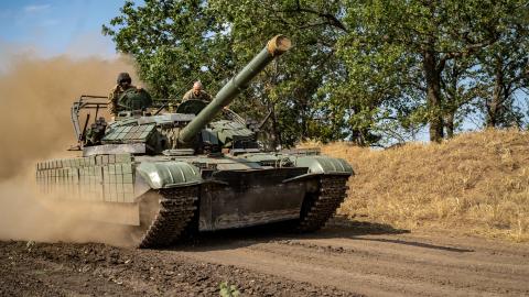 Ukrainian soldiers service their tanks and armored vehicles in Kherson Oblast, Ukraine, on August 8, 2025. (Fermin Torrano via Getty Images)