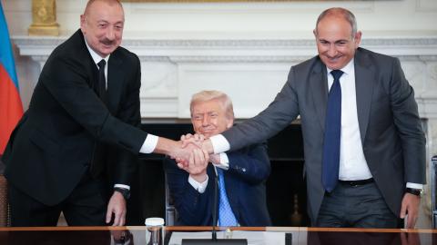 US President Donald Trump joins hands with Azerbaijani President Ilham Aliyev, and Armenian Prime Minister Nikol Pashinyan during a signing ceremony in the White House on August 8, 2025, in Washington, DC. (Andrew Harnik via Getty Images)
