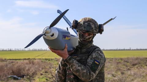 : A serviceman of the 34th Coastal Defense Brigade with the call sign ‘Shok’ holds the GOR drone, a Ukrainian reconnaissance aircraft that servicemen use to detect Russian enemy positions, at the launch point on March 14, 2025 in Kherson Oblast, Ukraine. The 34th Coastal Defense Brigade was recently formed based on the 124th Territorial Defense Brigade, which has been fighting for Kherson since the first days of the Russian full-scale invasion 2022. Over the past three years, the brigade’s units have also f