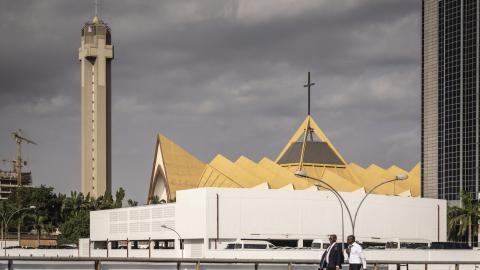 Pedestrians walk past the National Christian Church in the central business district of Abuja, Nigeria, on May 21, 2025. (Getty Images)