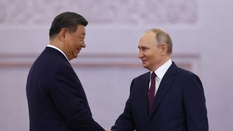 Russian President Vladimir Putin and his Chinese counterpart Xi Jinping shake hands during a welcoming ceremony at the Kremlin in Moscow on May 8, 2025. (Getty Images)