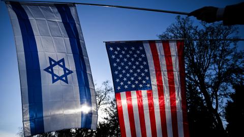A US flag and an Israeli flag in front of the US Consulate in Frankfurt, Germany, on January 16, 2026. (Getty Images)