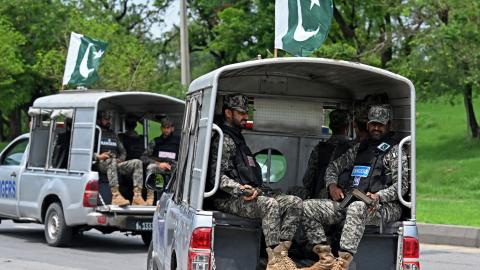 Security personnel patrol along a street in Islamabad on July 2, 2025. (Getty Images) Share to Twitter