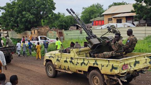 Children walk past a Sudanese military parade in Gedaref, Sudan, on August 14, 2025. (Getty Images)