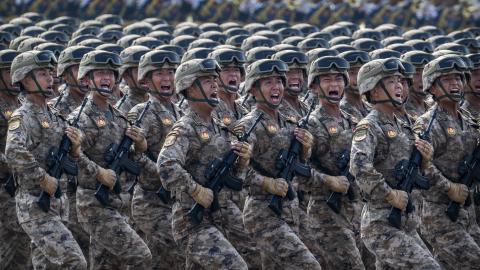 Chinese soldiers shout as they march during a military parade in Tiananmen Square on September 3, 2025, in Beijing, China. (Getty Images) Share to Twitter