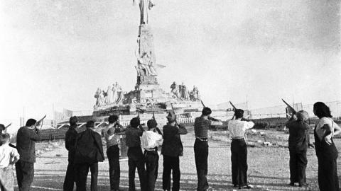  A Communist firing squad aiming at the colossal Monument of the Sacred Heart during the Spanish Civil War, 1936