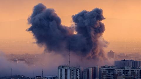 A plume of smoke rises after a strike on the Iranian capital Tehran, on March 3, 2026. (Getty Images)