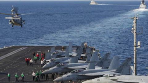 USS Abraham Lincoln (CVN 72) as an MH-60S Sea Hawk helicopter lifts off from the flight deck on November 19, 2019. (Getty Images)