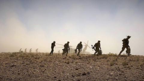 Troopers from dismount a UH-60 Blackhawk in preparation for a foot patrol in Afghanistan, September 4, 2018. (U.S. Army photo by First Lt. Stephen Doherty, 1SBCT, 4ID)