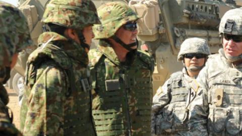 U.S. Army Maj. Gen. Stephen R. Lanza, right, commander of the 7th Infantry Division, meets Japanese Maj. Gen. Takeyoshi Omari, deputy commander of 4th Division, Japan Ground Self-Defense Force, during Rising Thunder at the Yakima Training Center