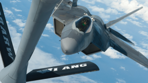 A Hawaii Air National Guard F-22 Raptor approaches a Wisconsin Air National Guard KC-135 Stratotanker to receive aerial refueling over the Pacific Ocean. (John Linzmeier/US Air National Guard)