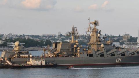 A Russian Moskva guided missile cruiser participates in a naval parade near a Ukrainian military base in Sevastopol. (Vasily Maximov/AFP via Getty Images)