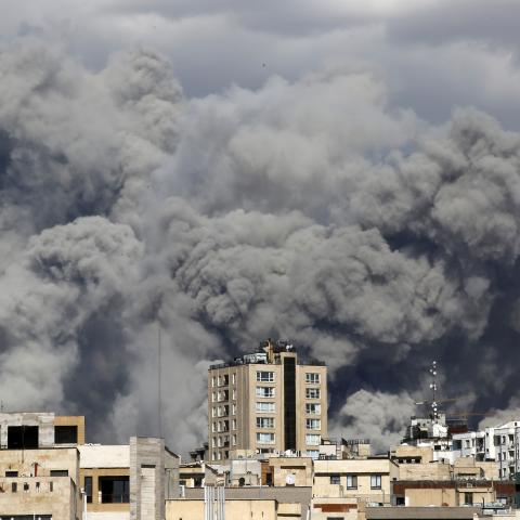 Smoke rises over a targeted site in Tehran as a series of explosions are heard on March 1, 2026. (Getty Images)