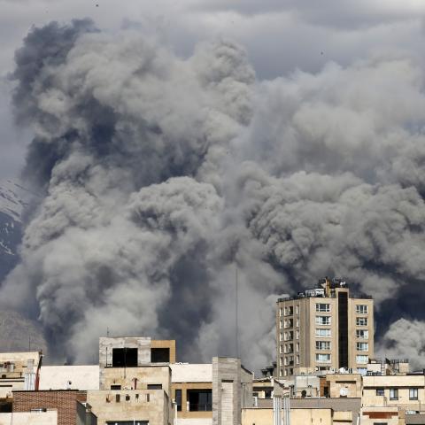 Smoke rises over a targeted site in Tehran as a series of explosions are heard on March 1, 2026. (Getty Images)